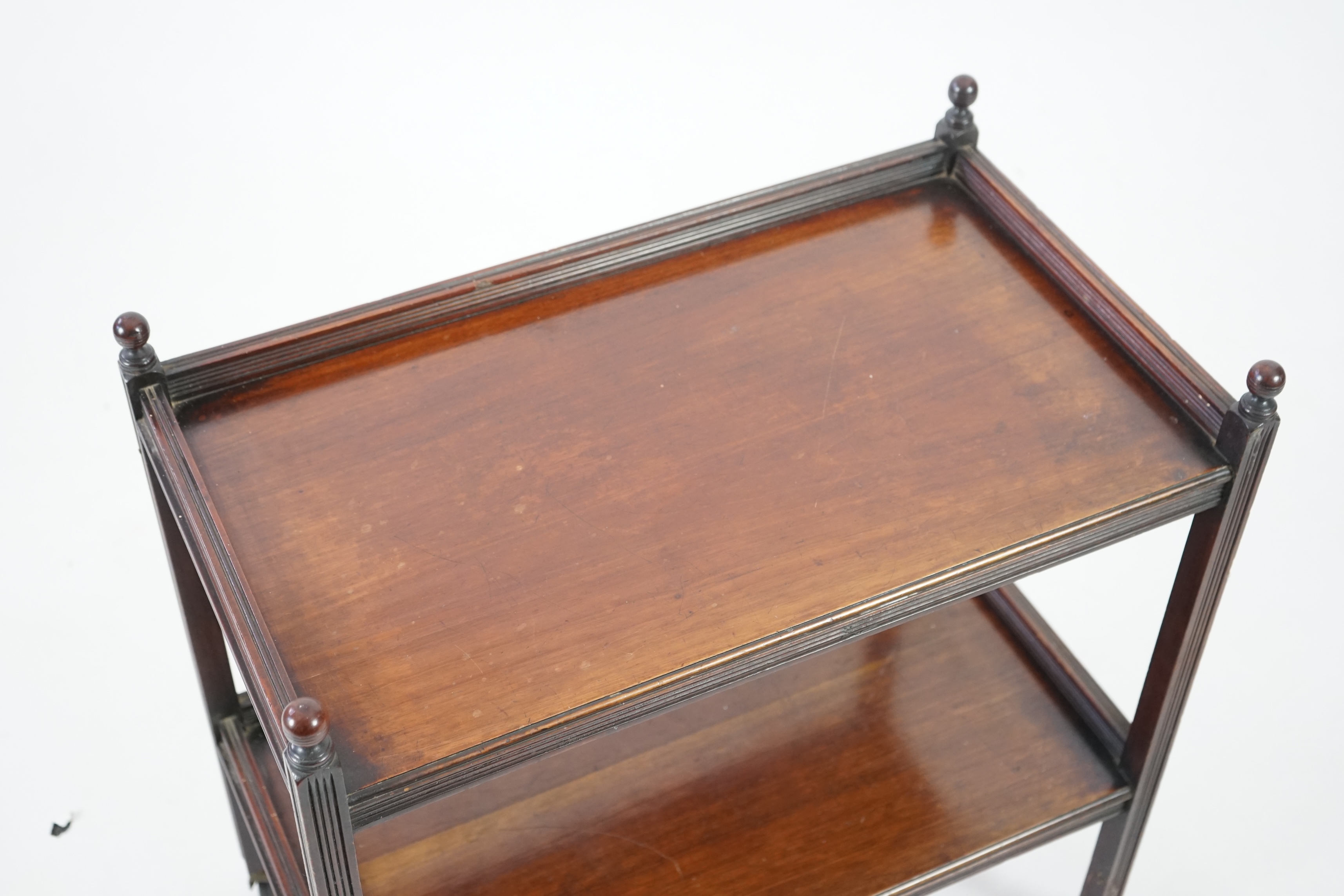 An Edwardian mahogany two tier trolley